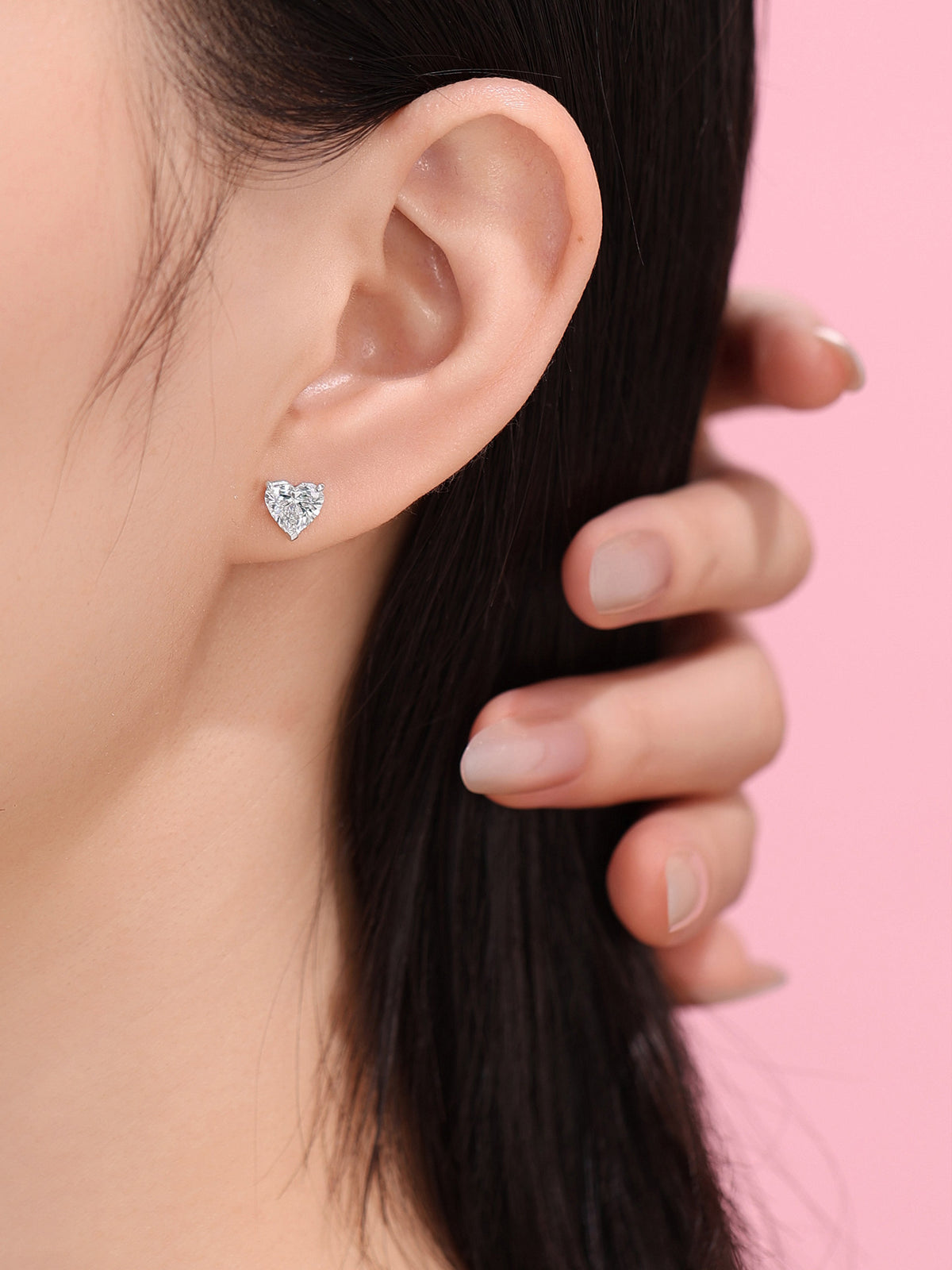 DANFÉE heart diamond stud on model with hair swept back