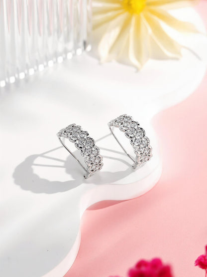 Dentelle lace diamond huggie earrings in PT950 platinum styled with flowers