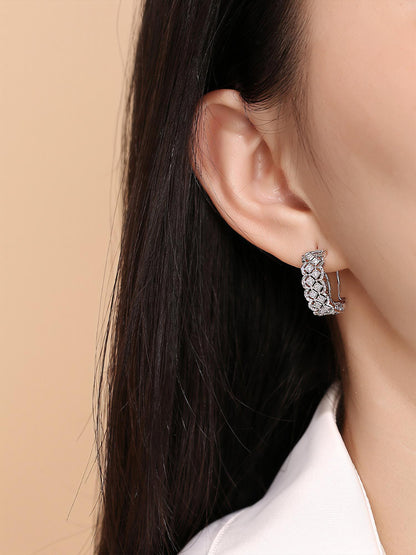 Dentelle lace lab-grown diamond huggie earring worn on the ear