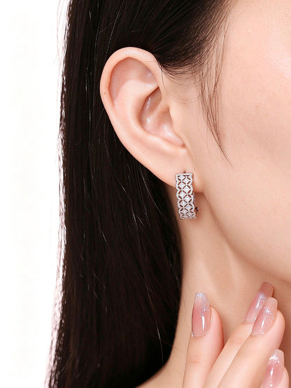 Dentelle lace lattice diamond huggie on the ear, front view