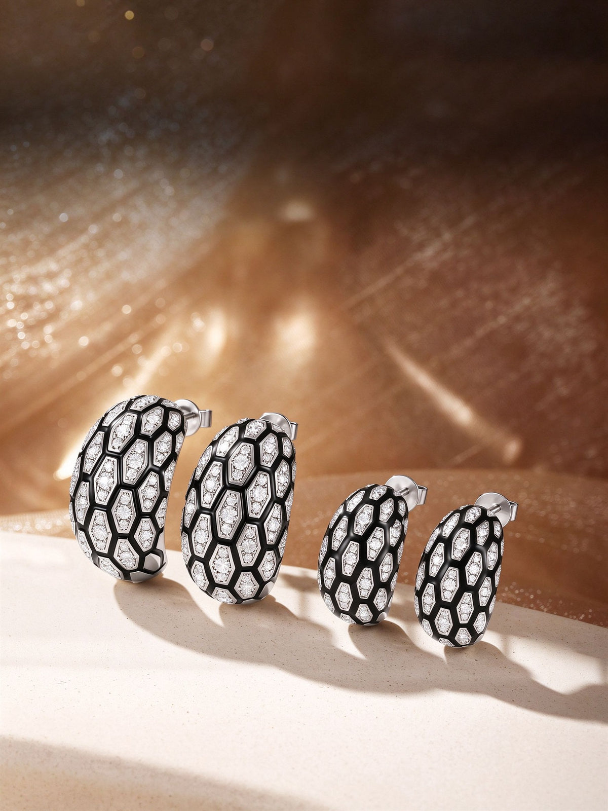 Écaille snake-scale diamond earrings in small and large sizes, 18K white gold