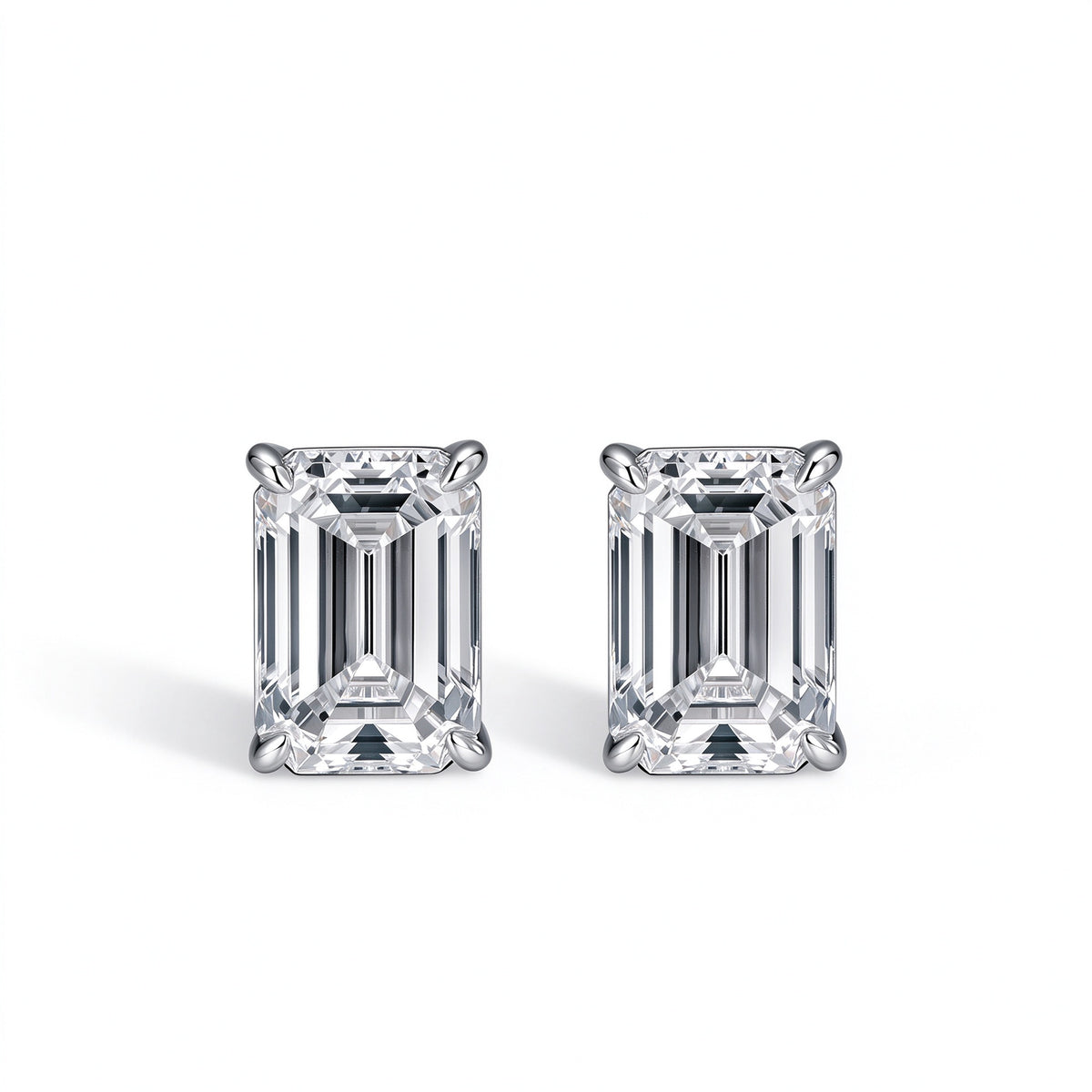 DANFÉE Éclat emerald-cut lab-grown diamond solitaire stud earrings in 18K white gold, front view on white