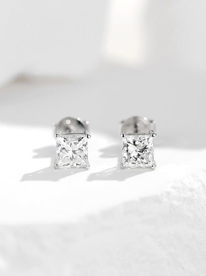 Pair of lab-grown diamond solitaire stud earrings in 18K white gold with four-claw settings