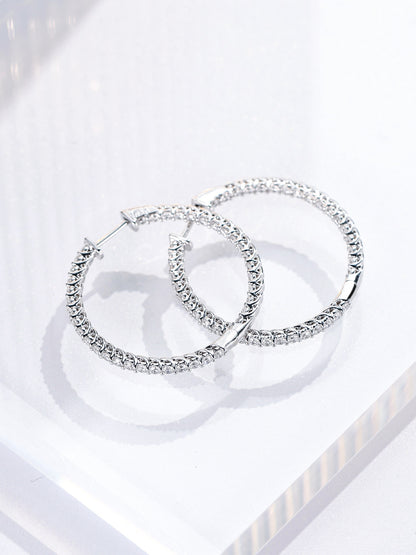 Lab-grown diamonds set on the outer and inner face of the 25mm hoop