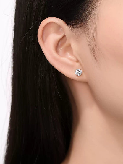 Side profile of the 1 carat Asscher-cut lab-grown diamond stud earring in 18K white gold worn on the ear