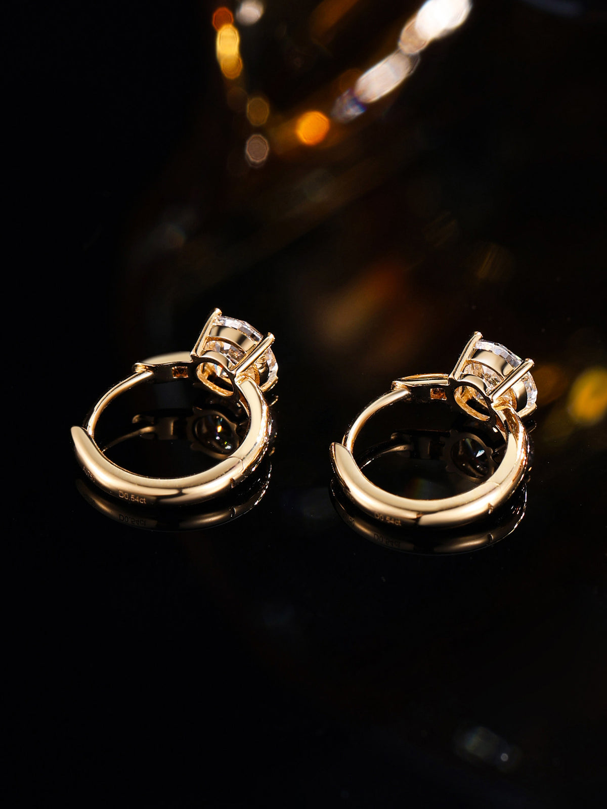 DANFÉE Étoile Solitaire round lab-grown diamond huggie earrings, lifestyle, 1 carat total, D-E VS