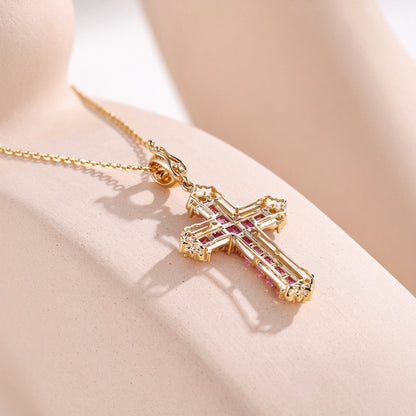 Back of the 18K gold cross pendant and enhancer clasp