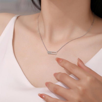 DANFÉE paperclip sliding lab-grown diamond necklace in 18K white gold worn on model