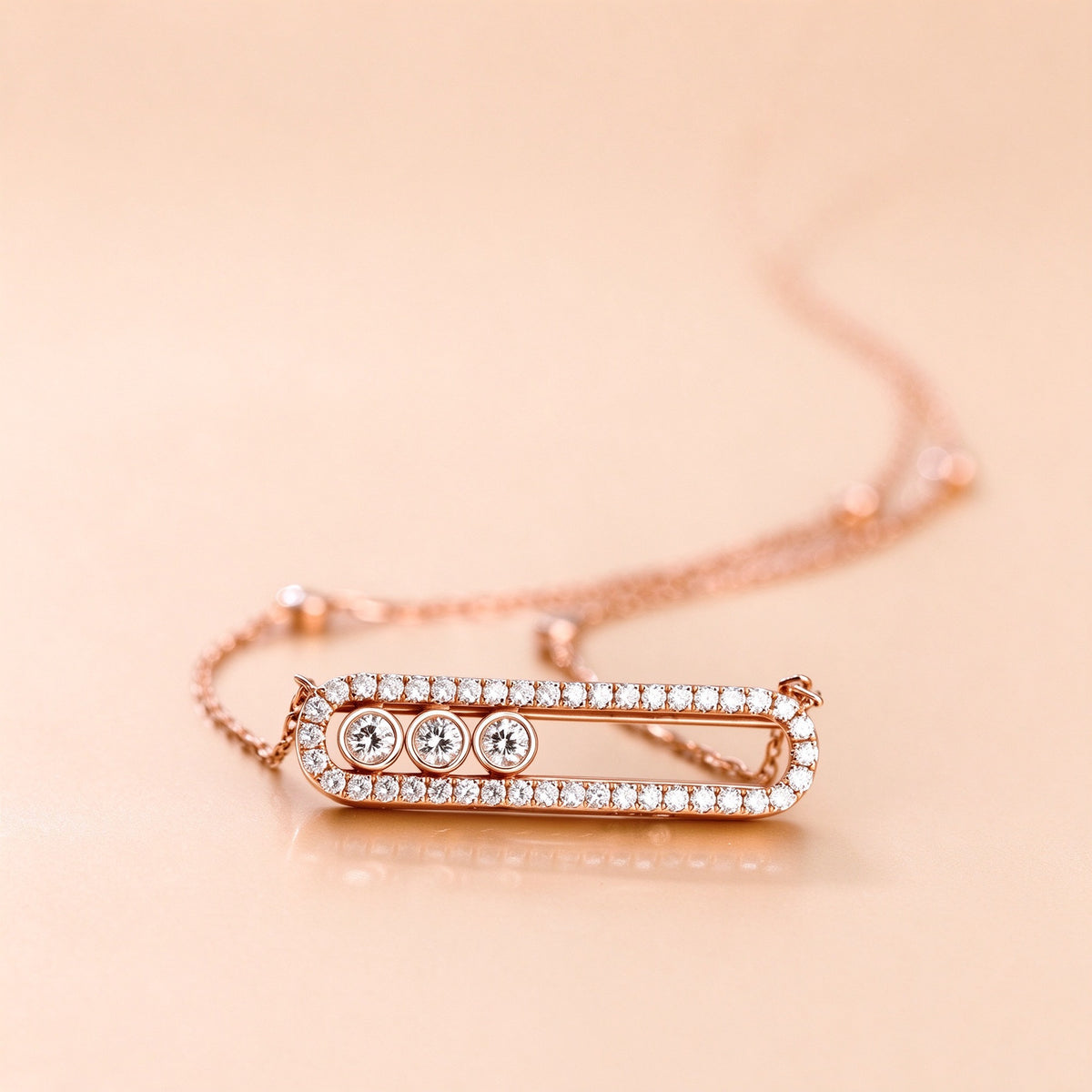 DANFÉE paperclip necklace with three sliding diamonds in 18K rose gold