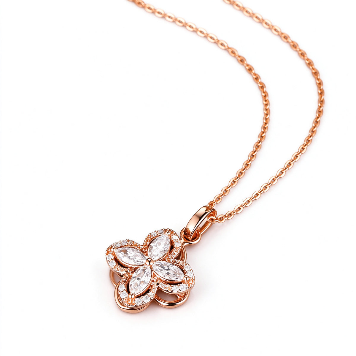 DANFÉE Kaleidoscope clover necklace, angled view of the spinning flower pendant
