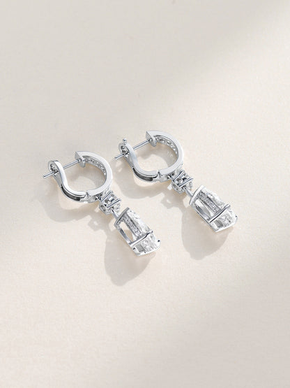 Back view of the 18K white gold diamond drop earrings showing the omega clip and pavé gallery