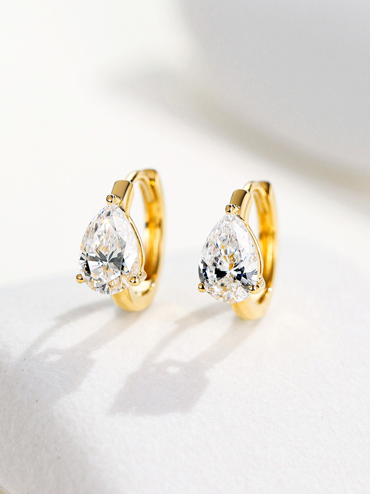 Pear-cut lab-grown diamond huggie hoop earrings, 18K gold, three-prong setting