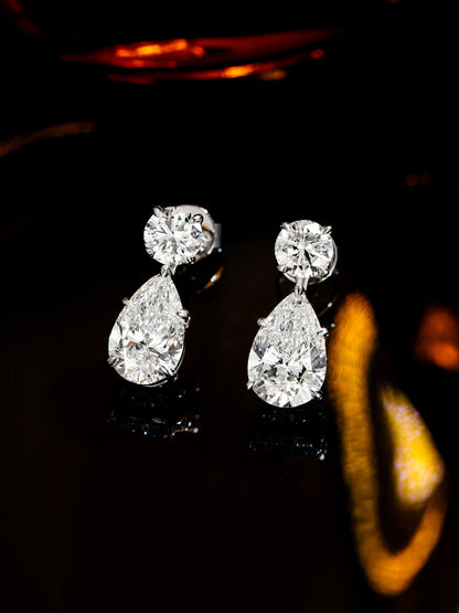 Two-stone pear and round lab-grown diamond earrings, D-E colour, VS clarity