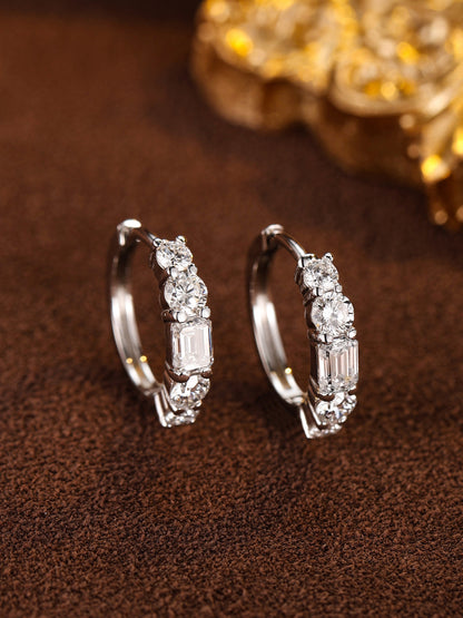 Emerald-cut lab-grown diamond huggie earrings in platinum with graduated round diamonds