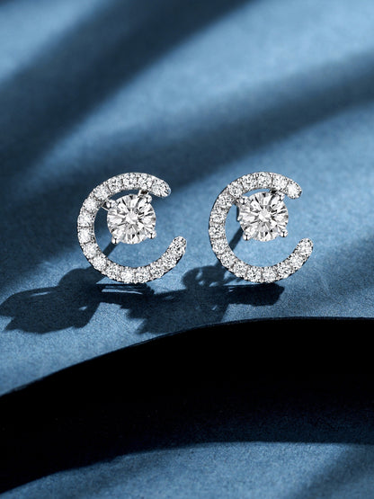 Lune crescent lab-grown diamond earrings in PT950 platinum on blue paper