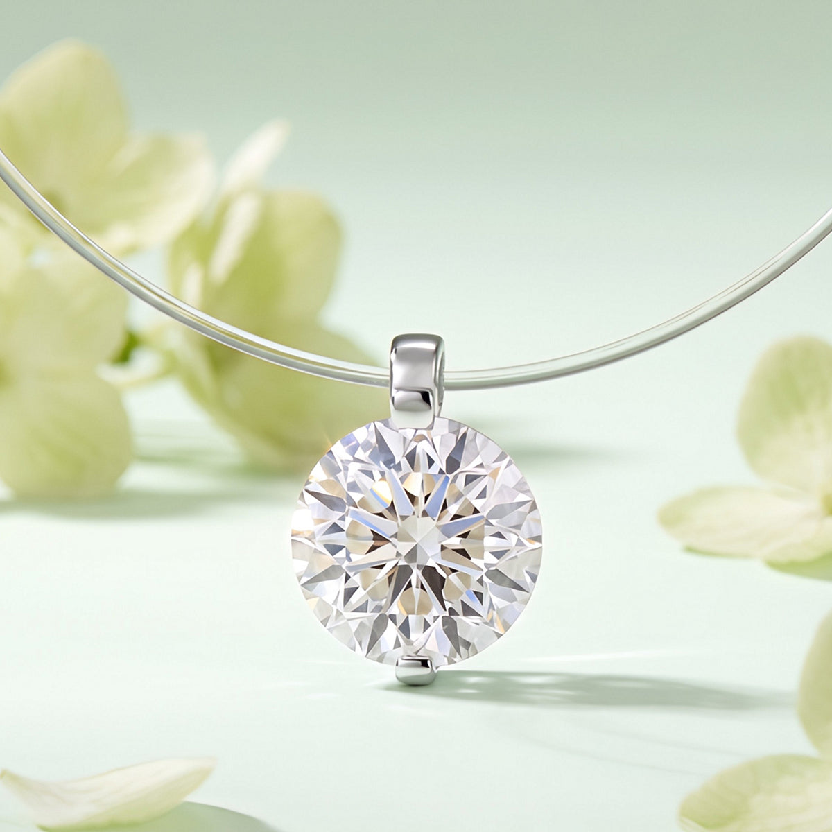 Close-up of the round lab-grown diamond in a two-prong PT950 platinum setting