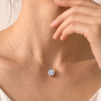 DANFÉE Mermaid's Tear diamond necklace worn on an invisible clear line
