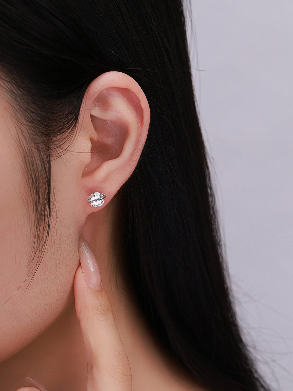 DANFÉE Orbite lab-grown diamond solitaire stud earrings, on model