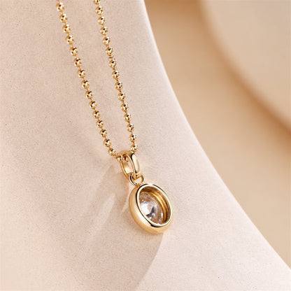 DANFÉE oval lab-grown diamond pendant, polished 18K yellow gold bezel and beaded chain detail