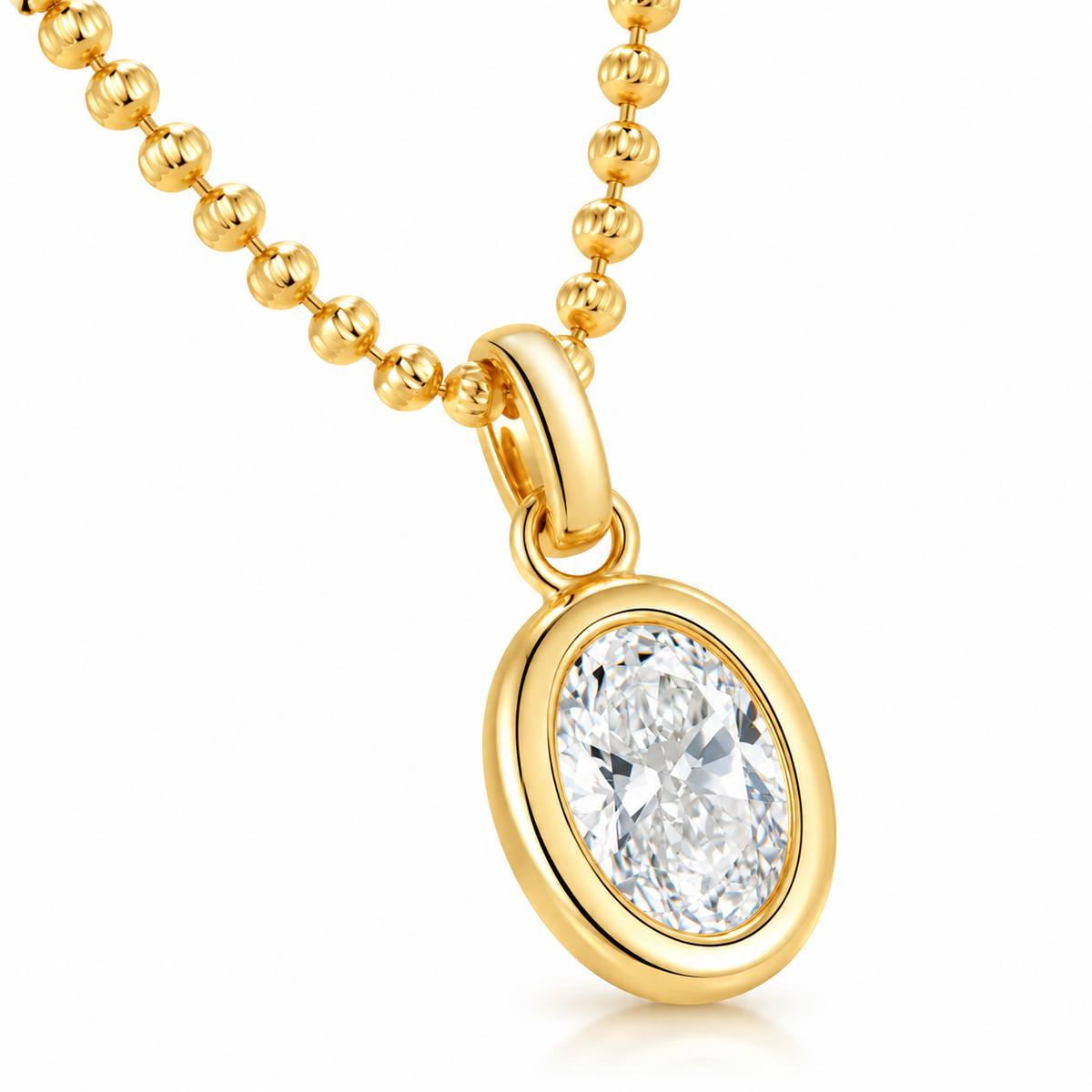 DANFÉE oval bezel diamond pendant in 18K yellow gold on white