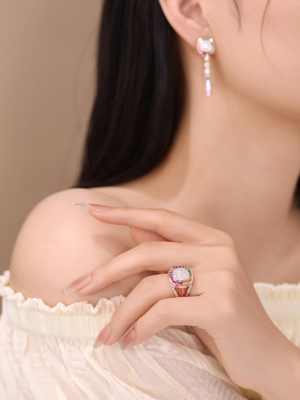 Rainbow gemstone diamond drop earring worn with a matching cocktail ring