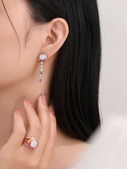Close-up of the cushion halo lab-grown diamond drop earring on the ear