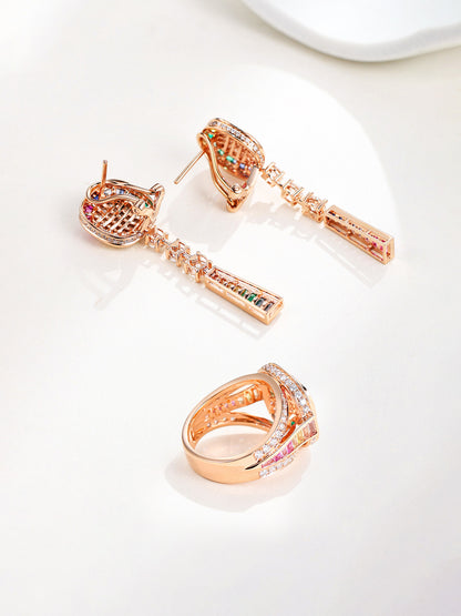 Back of the 18K gold drop earrings showing the omega clip and pavé-set gallery