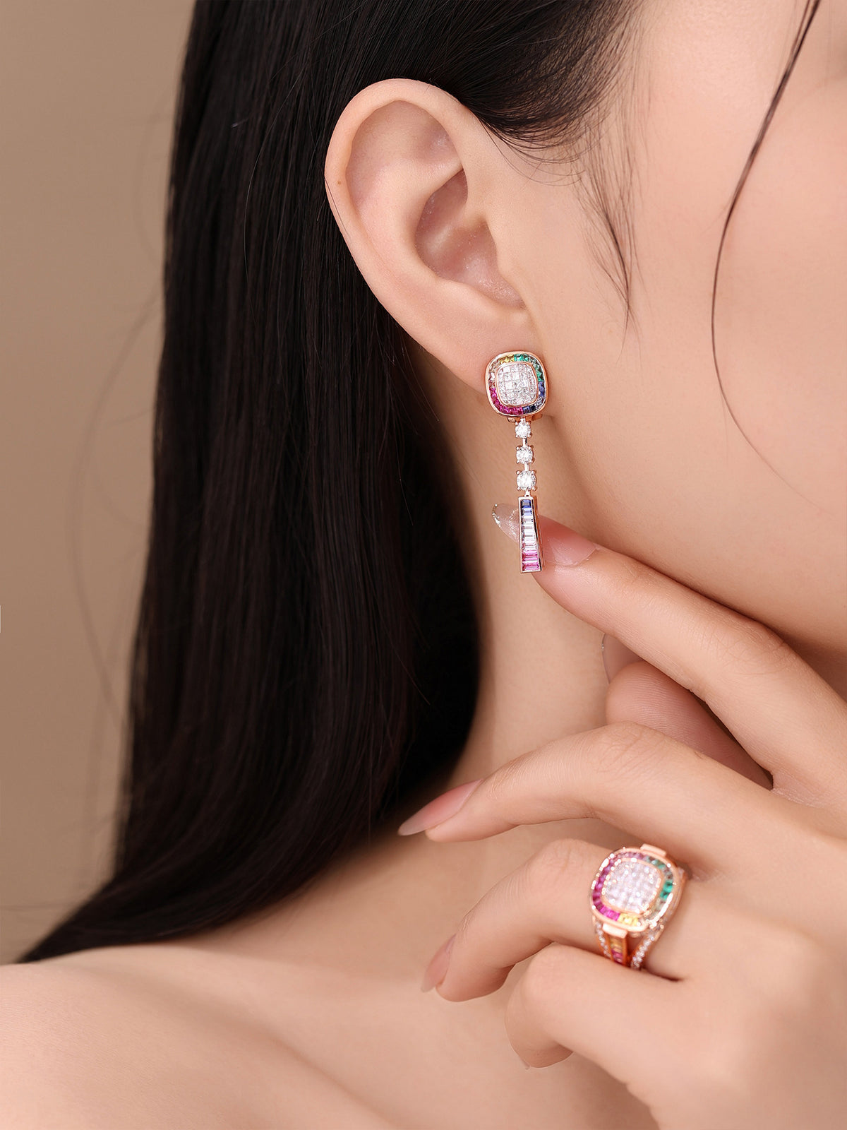 Model wearing the rainbow gemstone halo lab-grown diamond drop earring in 18K rose gold