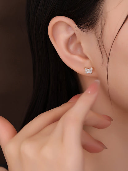 Butterfly diamond stud earring on the ear, 18K gold, 1 carat