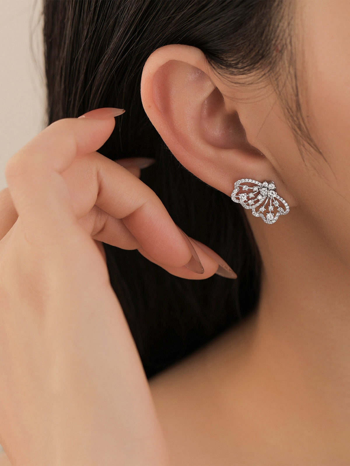 Papillon butterfly lab-grown diamond earring worn for evening occasions