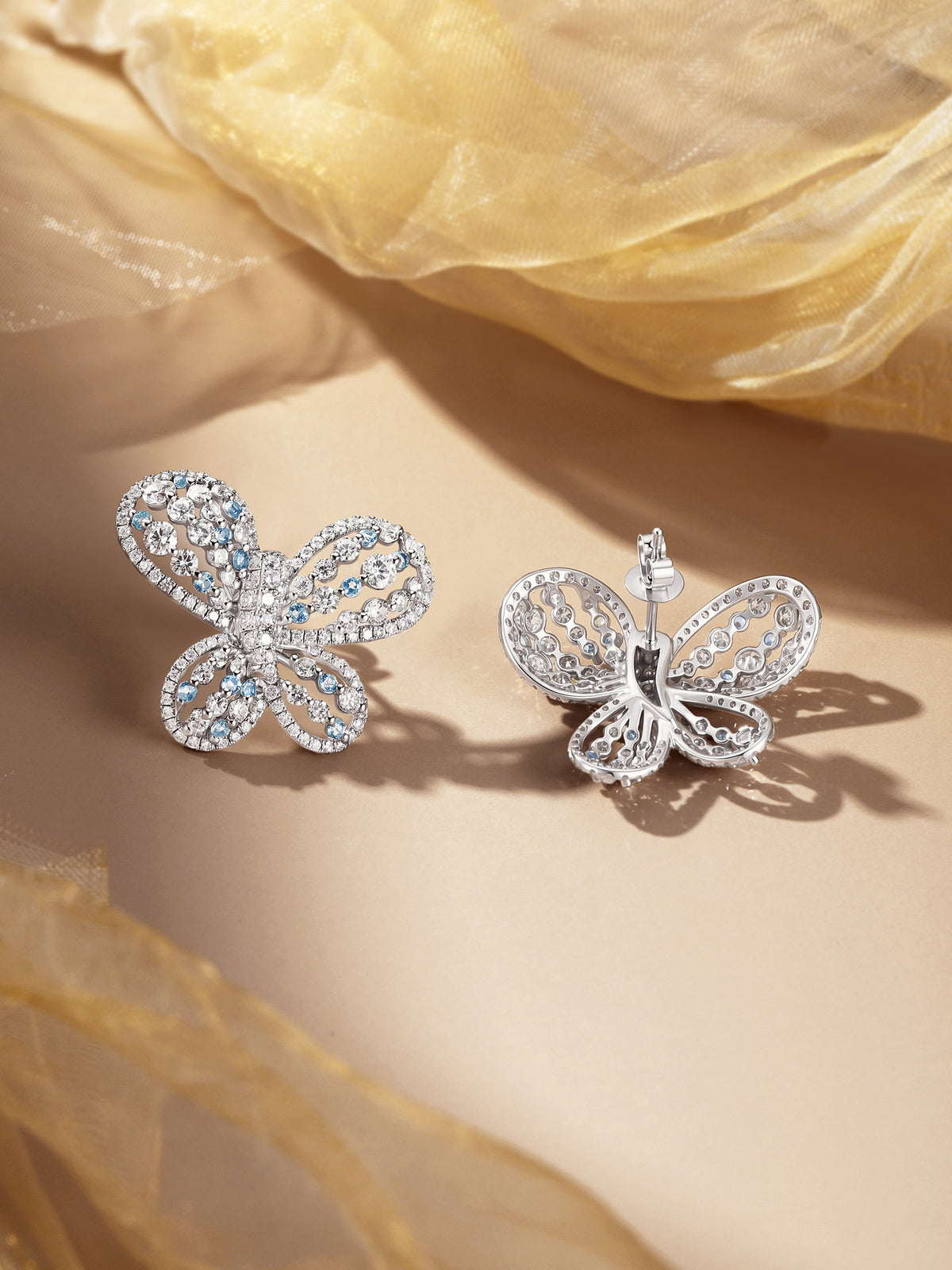Papillon butterfly diamond stud earrings, front and back showing post and push back