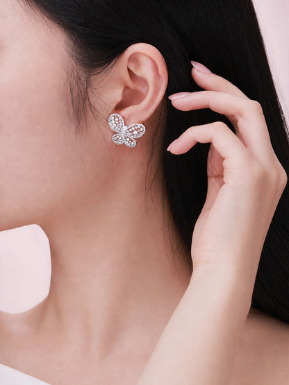 Papillon butterfly diamond stud earring worn on the ear