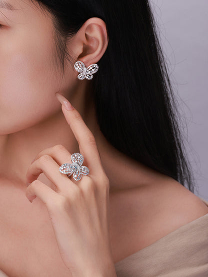 Model wearing Papillon butterfly diamond stud earring