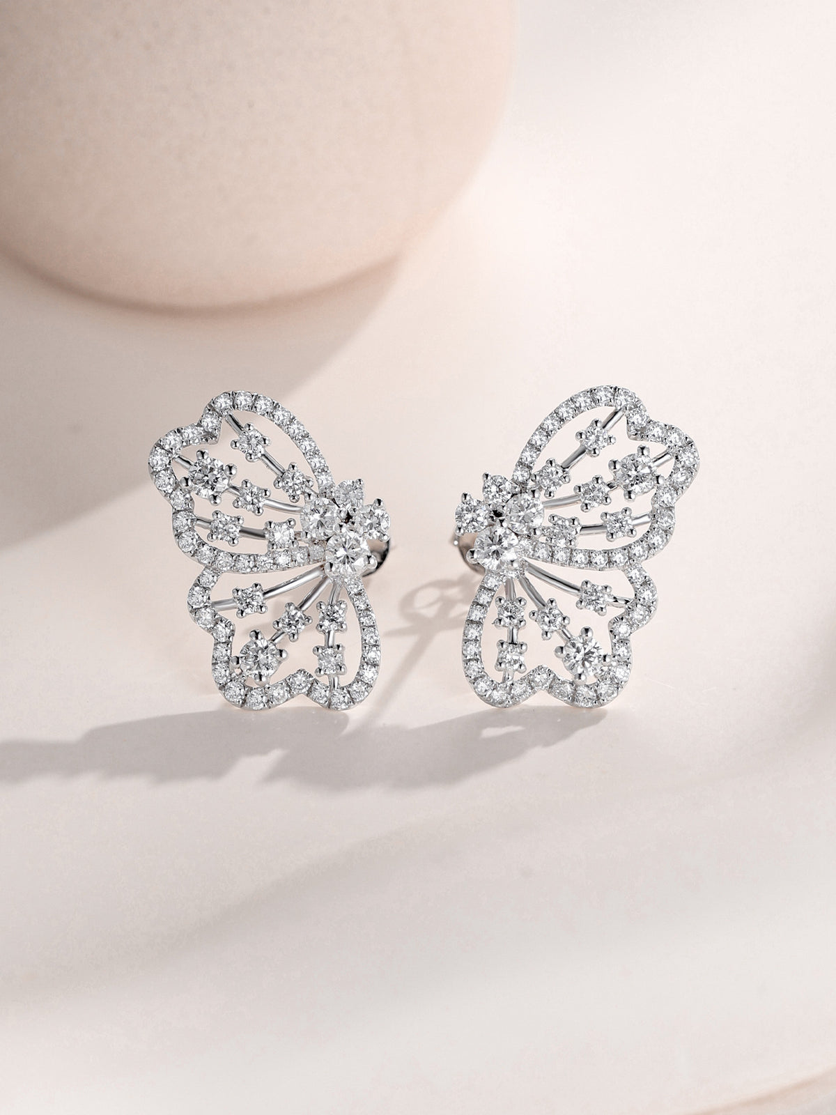 Mirrored pair of Papillon butterfly wing lab-grown diamond earrings