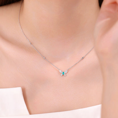 DANFÉE Paraiba butterfly lab-grown diamond necklace worn at the collarbone