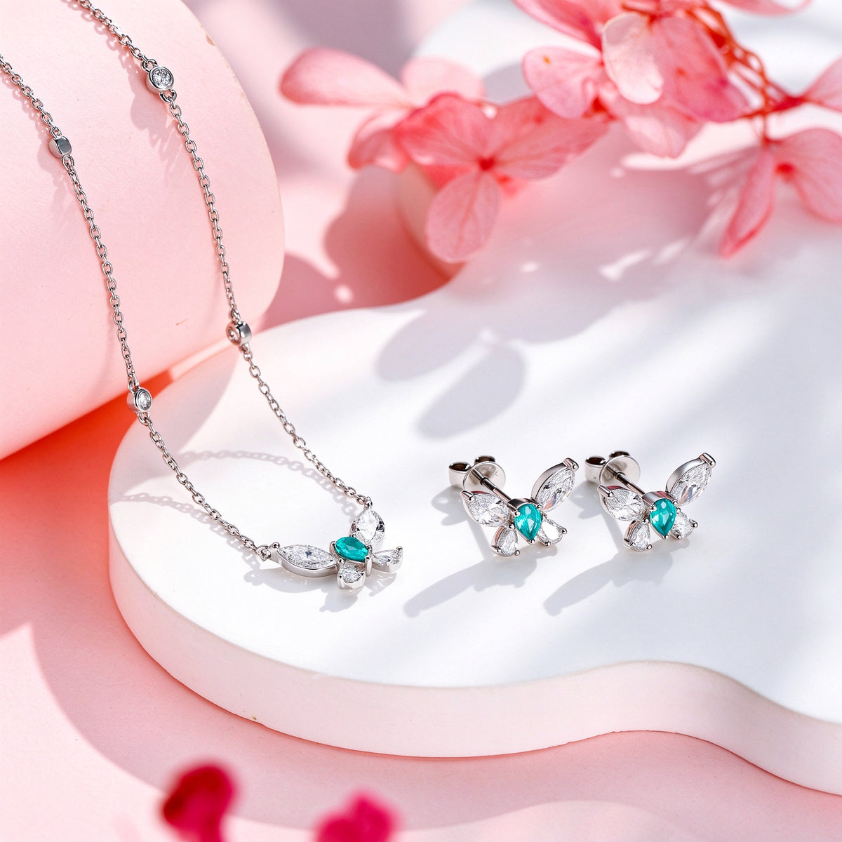 DANFÉE Paraiba butterfly diamond necklace and matching studs with pink blossoms