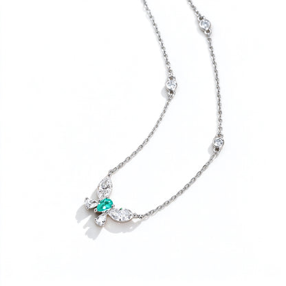 Side view of the DANFÉE butterfly necklace with marquise and pear lab-grown diamonds