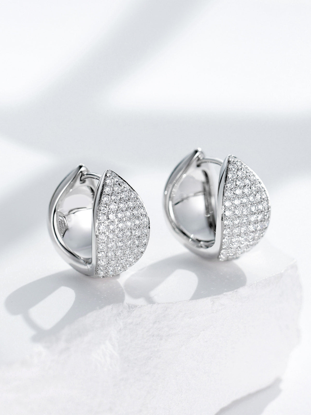 Pavé lab-grown diamond huggie earrings, polished and diamond sides