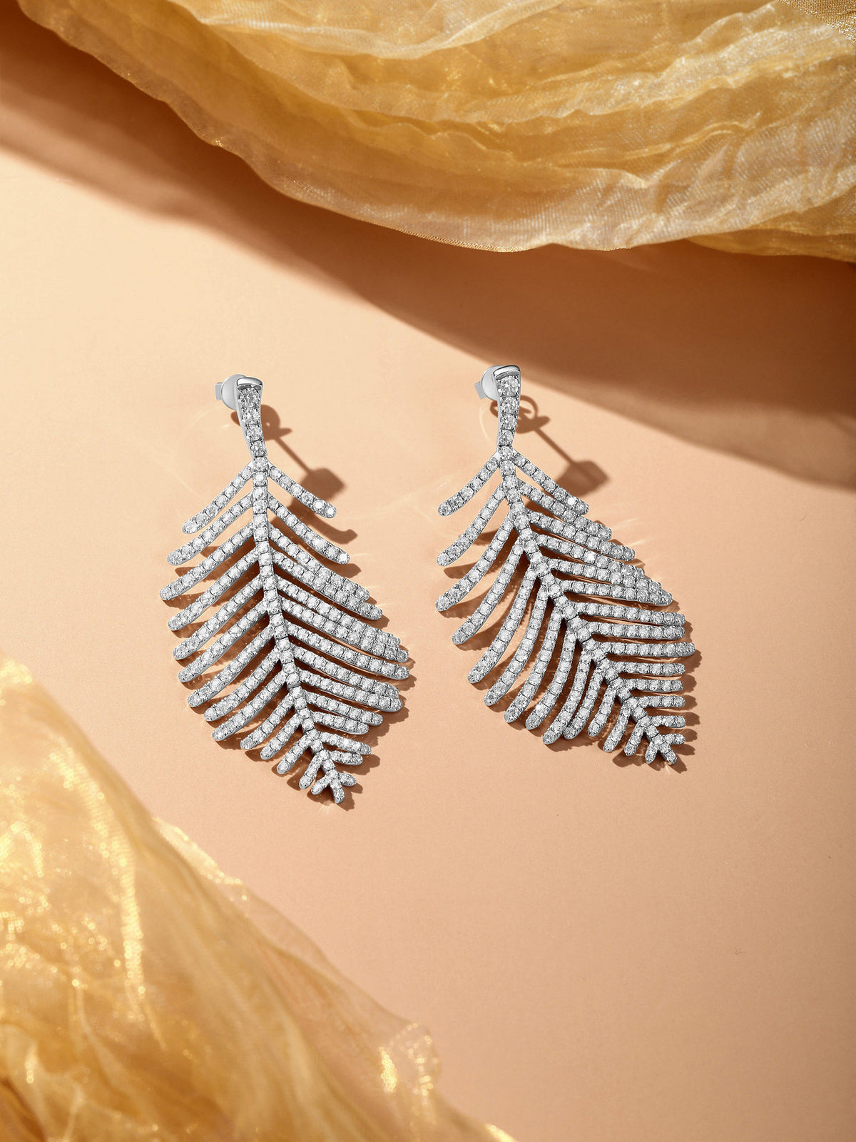 Feather-shaped lab-grown diamond drop earrings in 18K white gold with gold organza