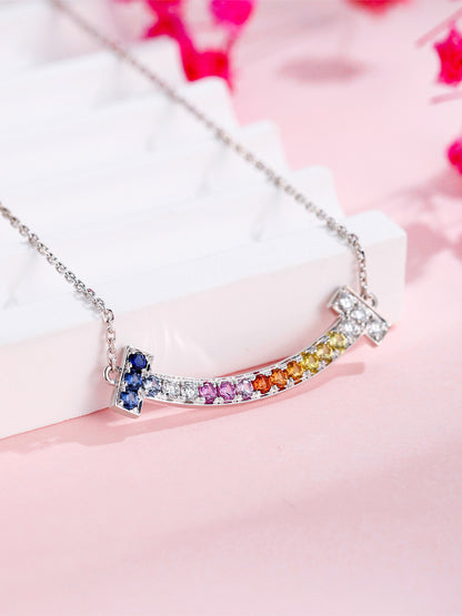 DANFÉE Rainbow Smile necklace with rainbow pavé curved bar, styled view