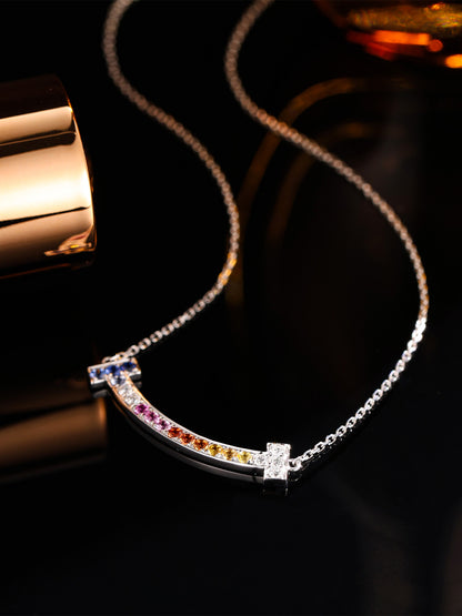 DANFÉE Rainbow Smile lab-grown diamond necklace on dark background