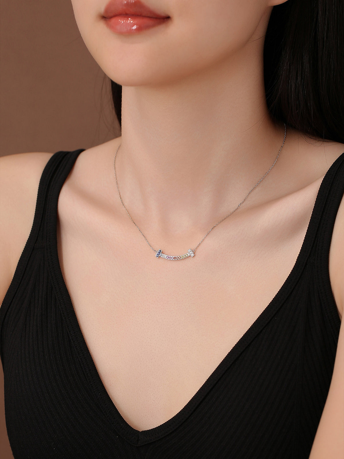 DANFÉE Rainbow Smile necklace worn at the collarbone
