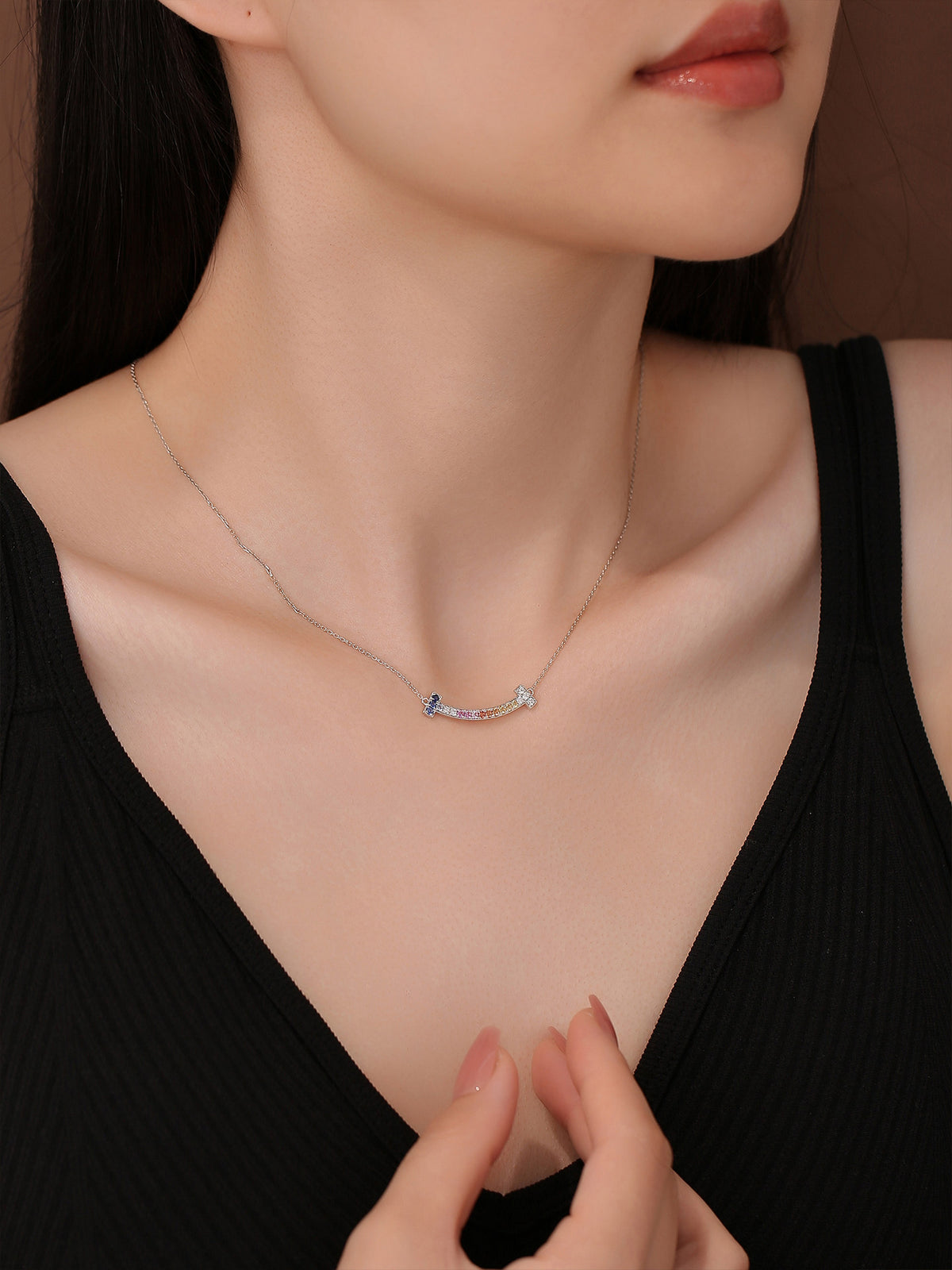 DANFÉE Rainbow Smile necklace on model, side view