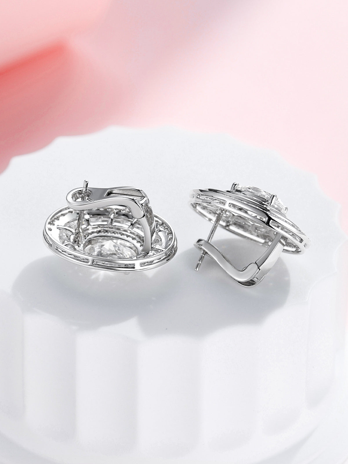 Back view of the oval diamond earrings showing the post and omega clip