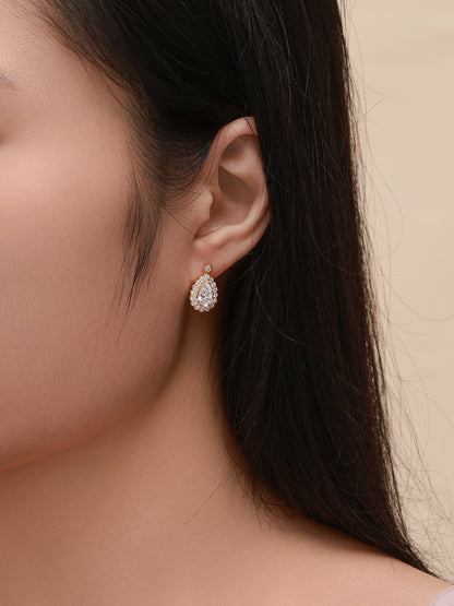 Lab-grown diamond pear halo drop earring worn, side profile