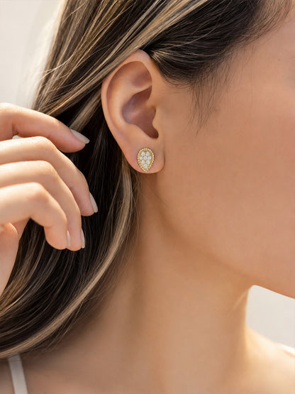 On-ear view of 0.6 carat pear pavé lab-grown diamond stud earrings, D-E VS