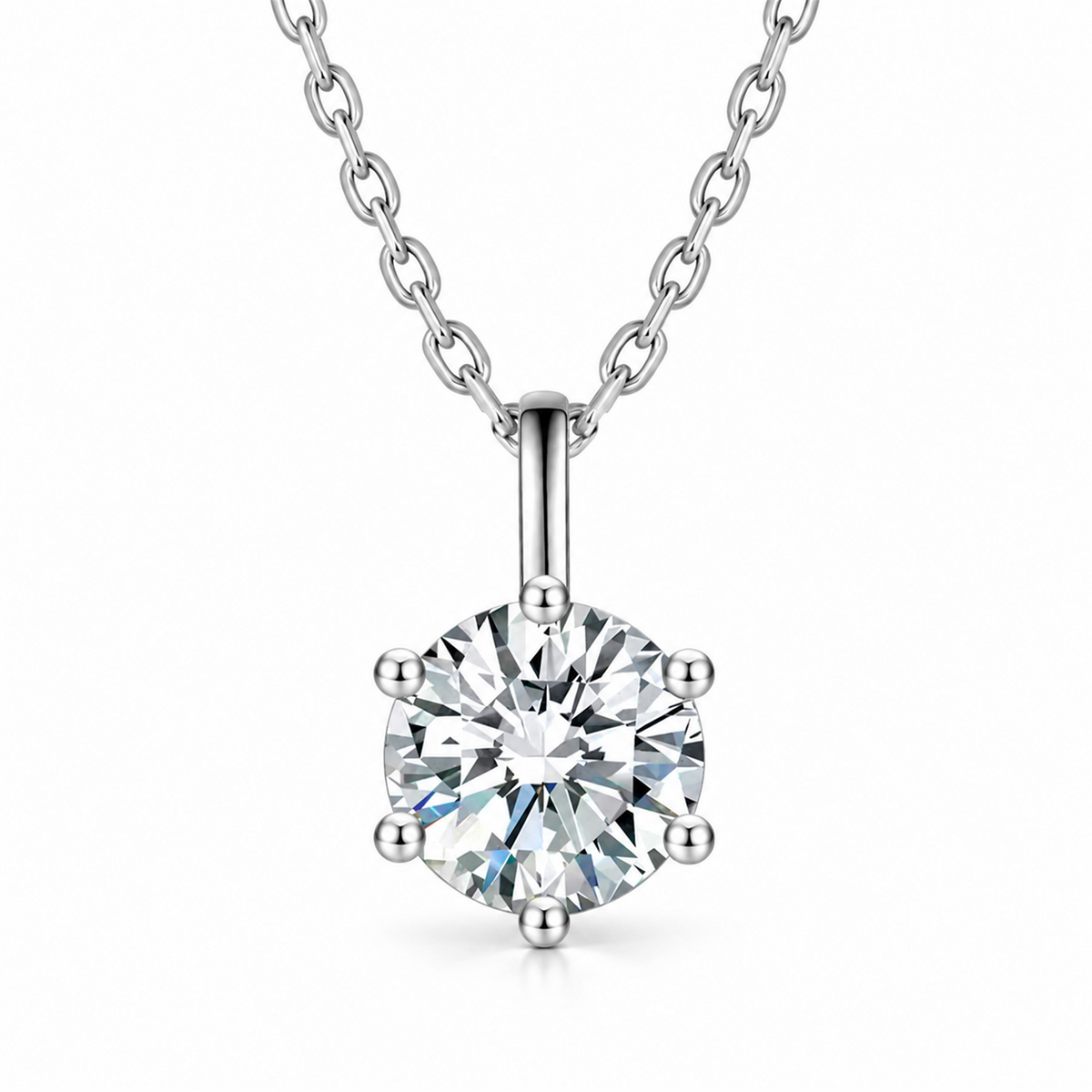 Six-prong diamond pendant necklace in 18K white gold on white