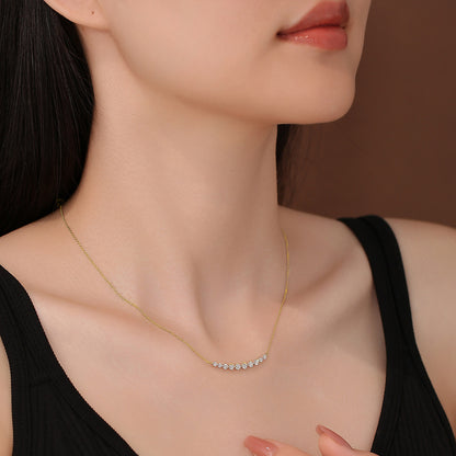 DANFÉE Smile 18K yellow gold diamond necklace worn at the collarbone