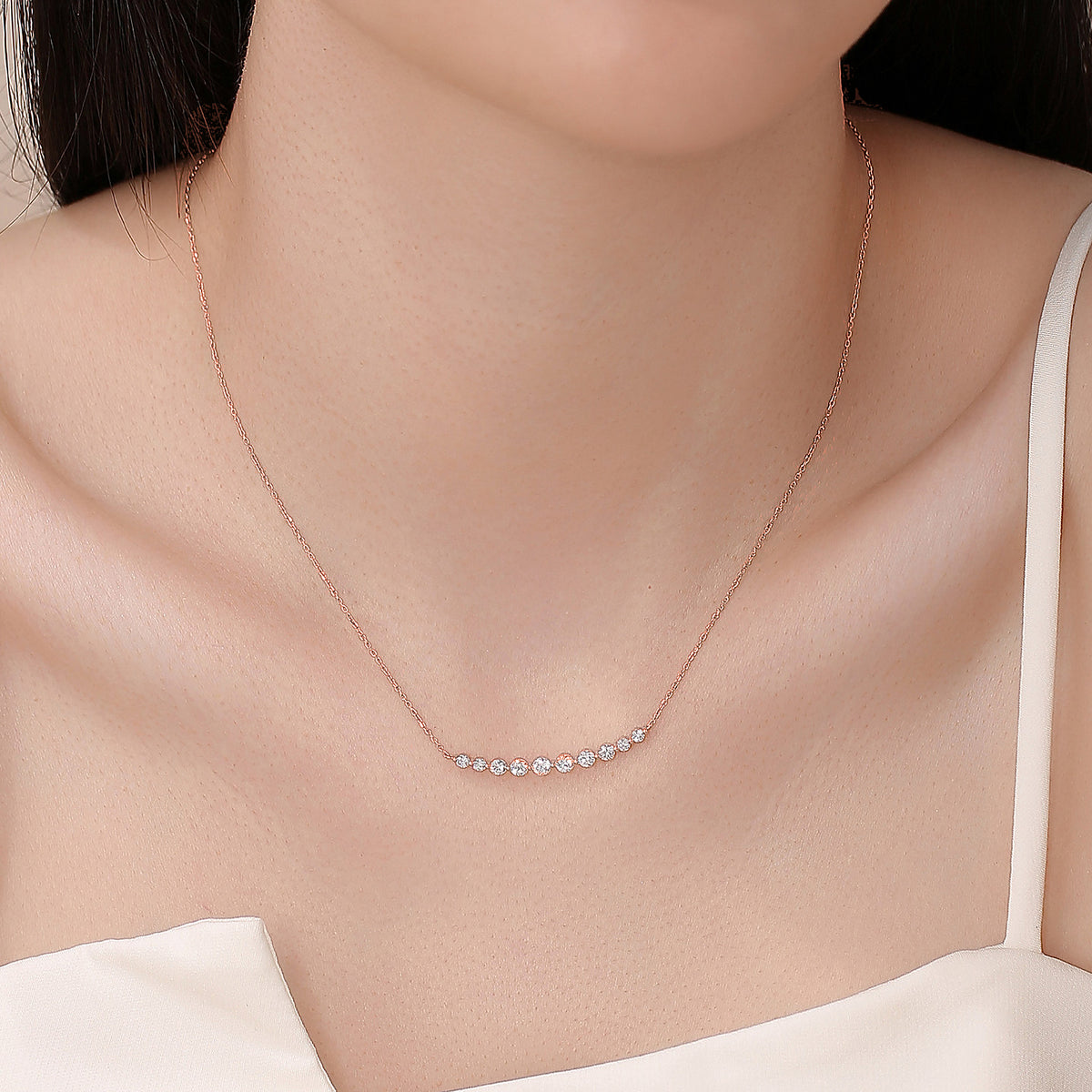 DANFÉE Smile 18K rose gold diamond necklace worn at the collarbone