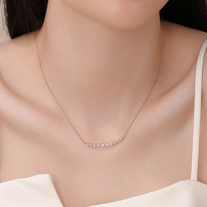 DANFÉE Smile 18K rose gold diamond necklace worn at the collarbone